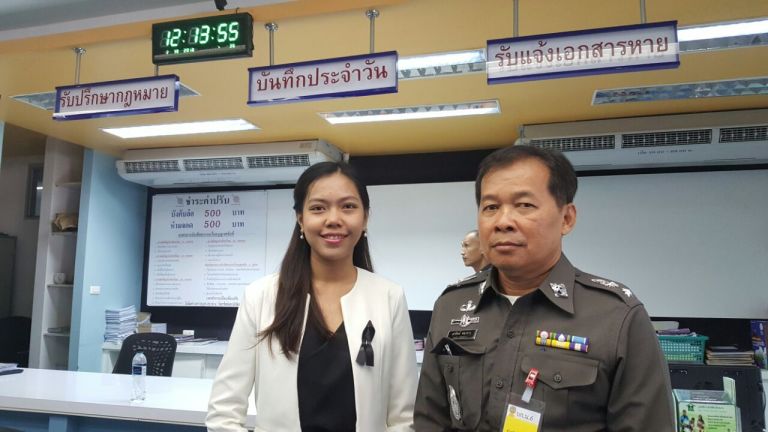 Ms Sirikan Charoensiri and Lt Col Manit Thongkhao at the Samranrat Police Station in Bangkok